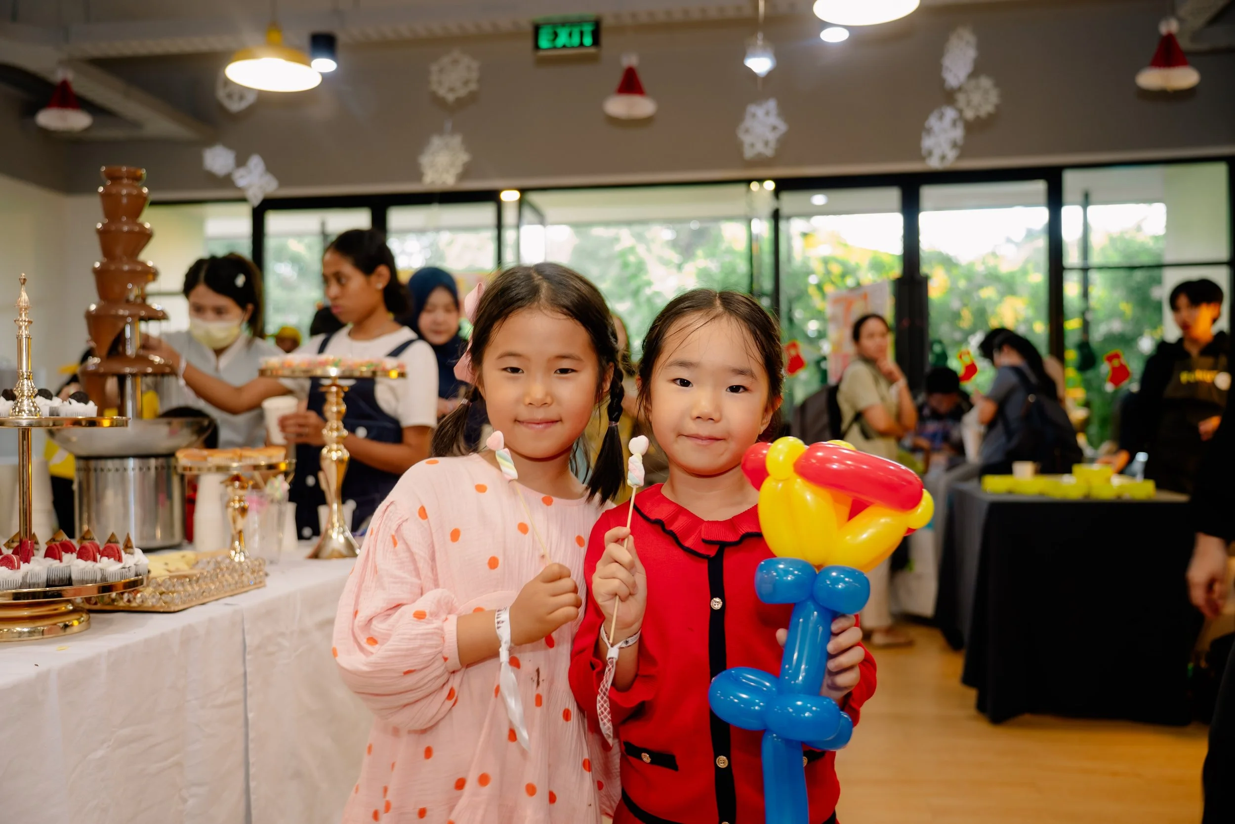 Families enjoying the ISJ Christmas Fair